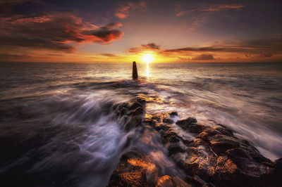 Scenic view of sea during sunset