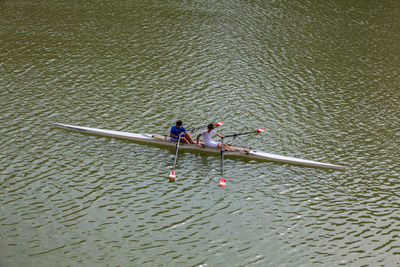 High angle view of people enjoying in river