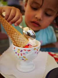 Close-up of woman holding ice cream