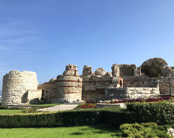 Ruins of building against clear sky