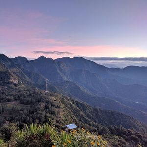 Scenic view of mountains against sky during sunset