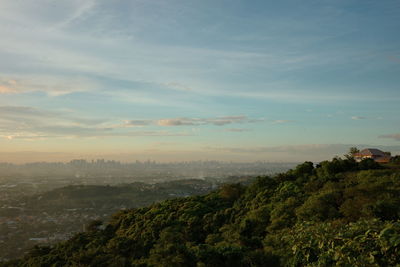 Scenic view of metro manila landscape against sky during sunset