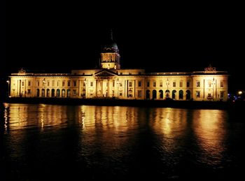 View of illuminated buildings at night