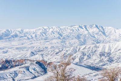 An incredibly beautiful panorama of the winter mountains of the tien shan in uzbekistan