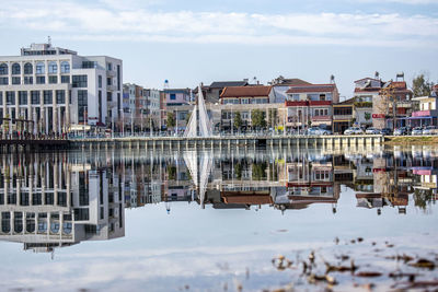 Reflection of buildings in lake