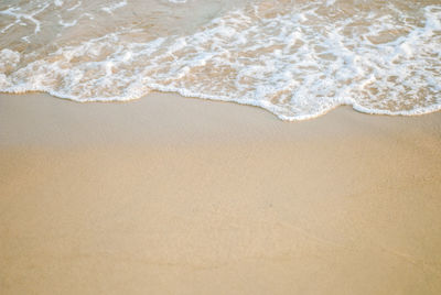 Close-up of sand at beach