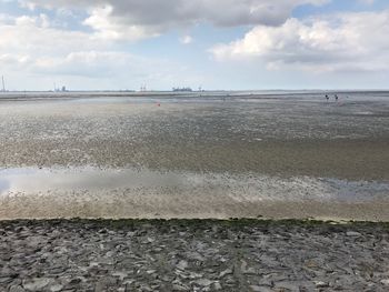 Scenic view of beach against sky