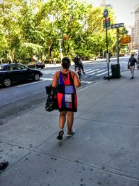 Woman walking on street