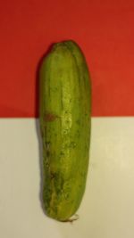 Close-up of green pepper against white background