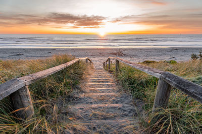 Beautiful sunrise at new brighton beach, christchurch, new zealand.