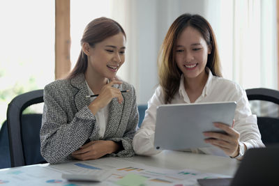 Business colleagues working at office