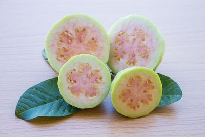 Close-up of fruits against white background