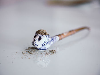 High angle view of cigarette on table