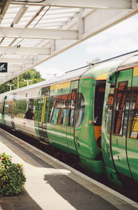 Train by railroad station platform