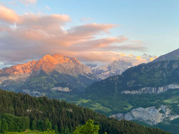 Scenic view of mountains against sky during sunset