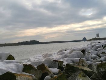 Scenic view of sea against sky during sunset