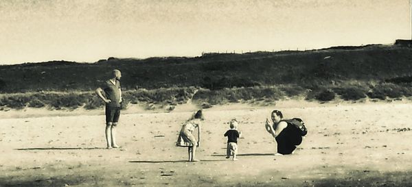 Boy playing with arms raised