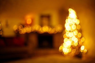 Close-up of illuminated christmas tree at night