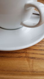 High angle view of coffee cup on table