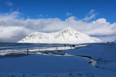 Scenic view of snowcapped mountains against sky norway