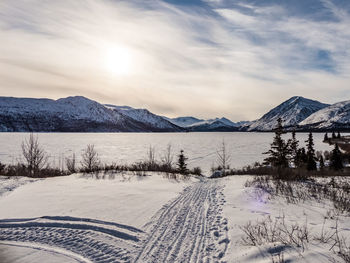 Scenic view of snowcapped mountains against sky
