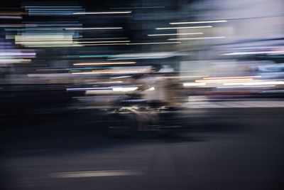 Blurred motion of traffic on city street at night