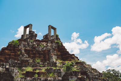 Low angle view of old building against sky