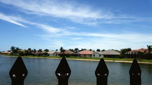 Panoramic view of sea and buildings against sky