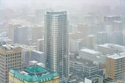 Aerial view of cityscape during winter