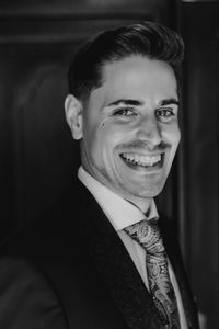 Portrait of smiling groom