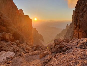 Scenic view of mountains against sky during sunset