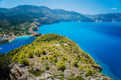 High angle view of bay against mountains