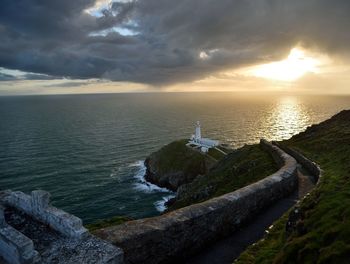 Scenic view of sea against sky during sunset