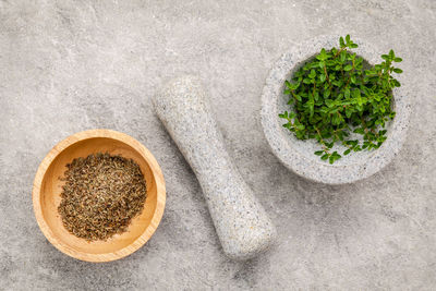 High angle view of herbs in mortar