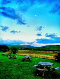 Scenic view of landscape against cloudy sky