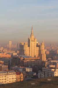 Buildings in city against sky