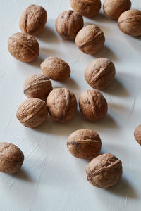 Close-up of peanuts on white background