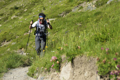 Hiker in tena valley, pyrenees in spain.