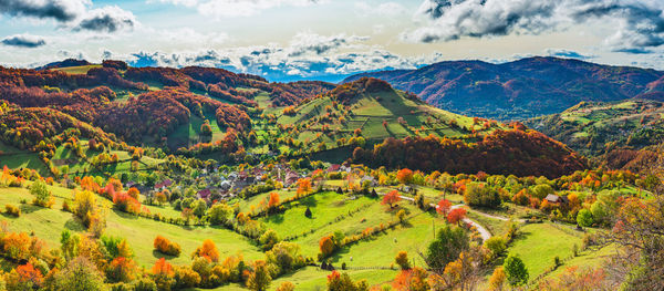 Scenic view of field against sky during autumn