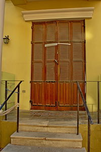 Closed wooden door of building