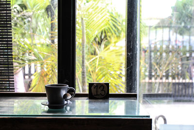 Close-up of coffee cup on table