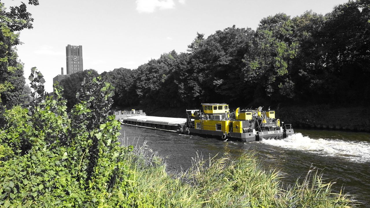 transportation, tree, mode of transport, building exterior, built structure, architecture, water, nautical vessel, boat, sky, house, river, land vehicle, green color, growth, day, high angle view, moored, car, nature