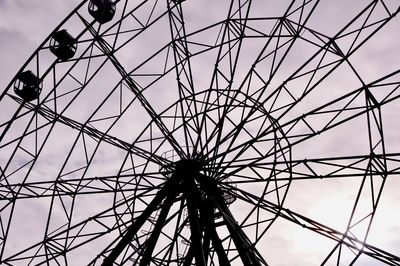 Low angle view of ferris wheel against sky