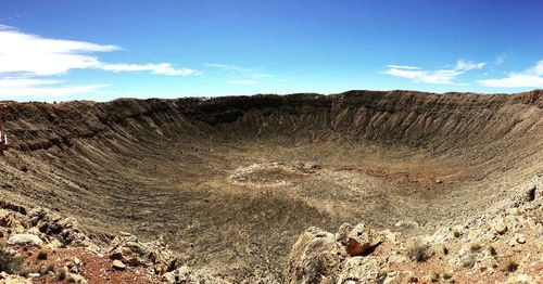 View of meteor crater against sky