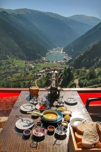 High angle view of food on table against mountain