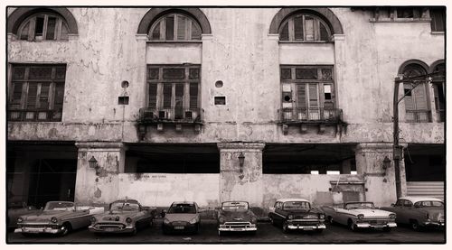 Cars on building in city
