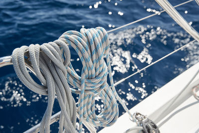 High angle view of rope tied to sailboat