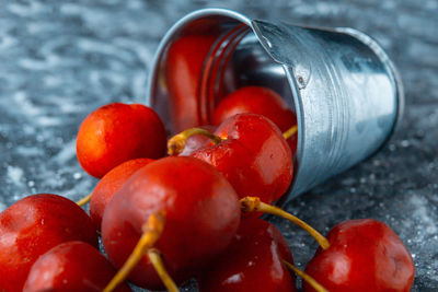 Close-up of cherries on table