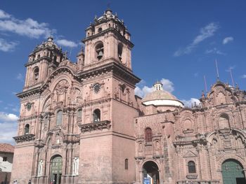 Low angle view of bell tower against sky