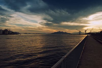 Scenic view of sea against cloudy sky